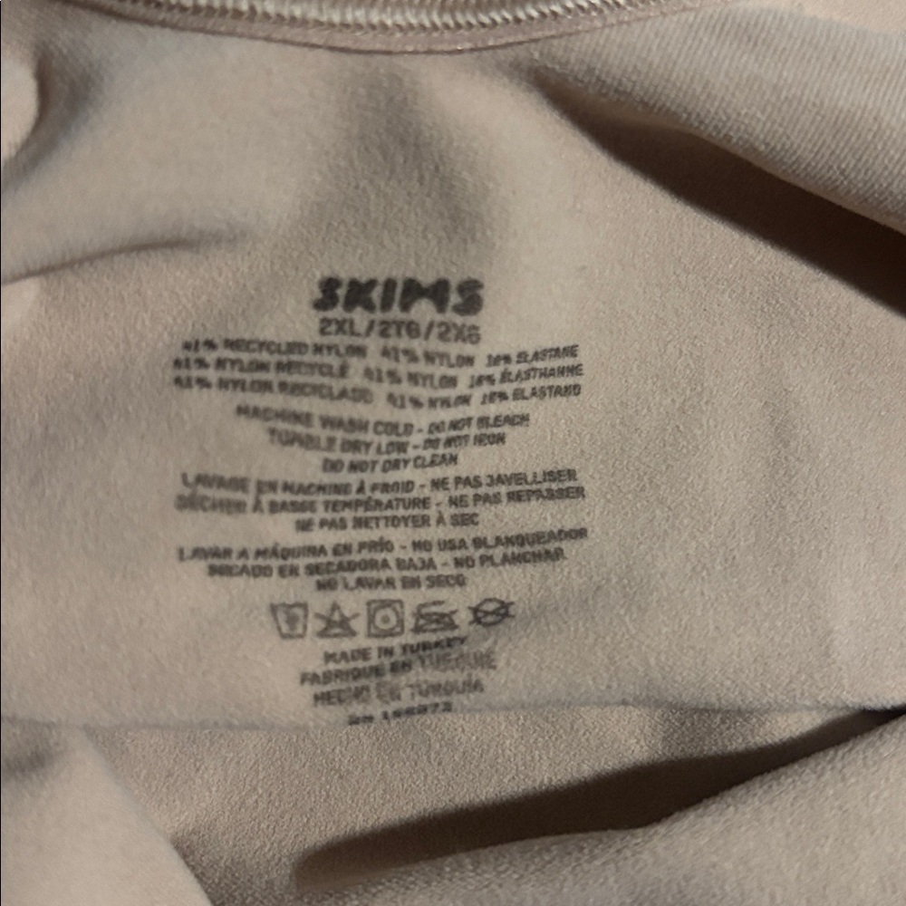 SKIMS Seamless Mid-Thigh Bodysuit in Warm Tan - Picture 7 of 8